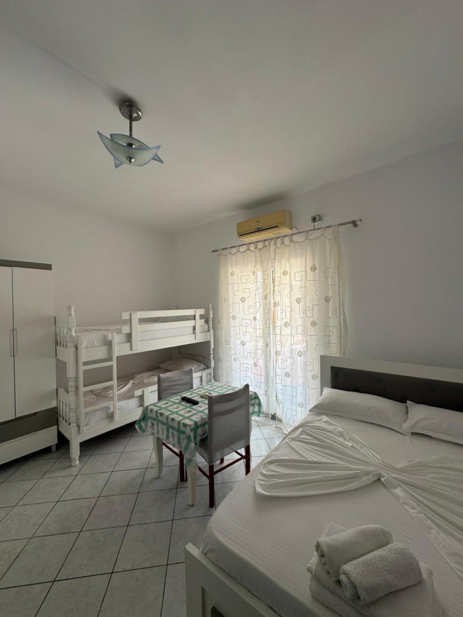Caushi Apartments Ксамил Экстерьер фото